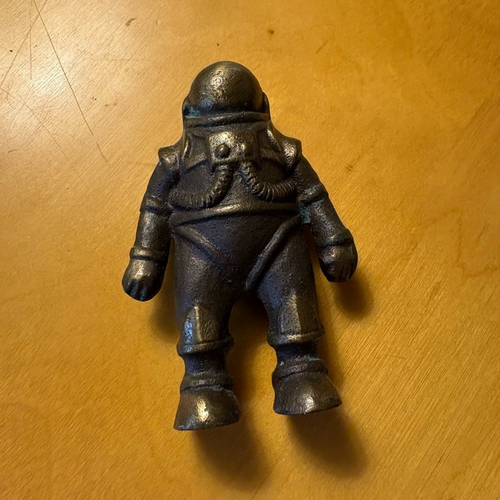 Bronze spaceman sculpture